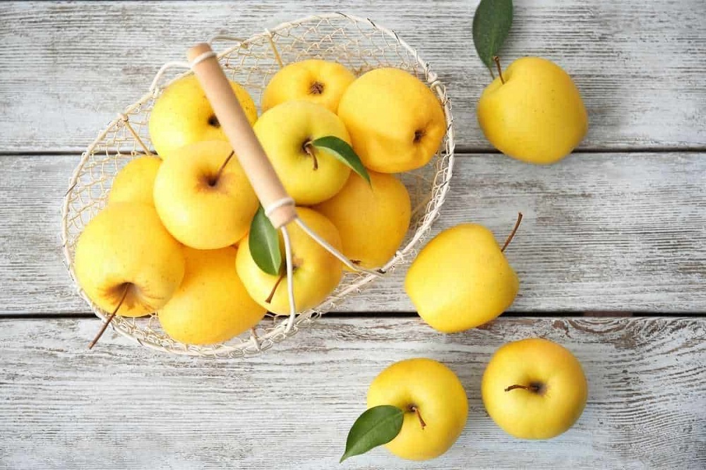 نگاهی به خواص سیب زرد و فایده های مصرف این میوه محبوب